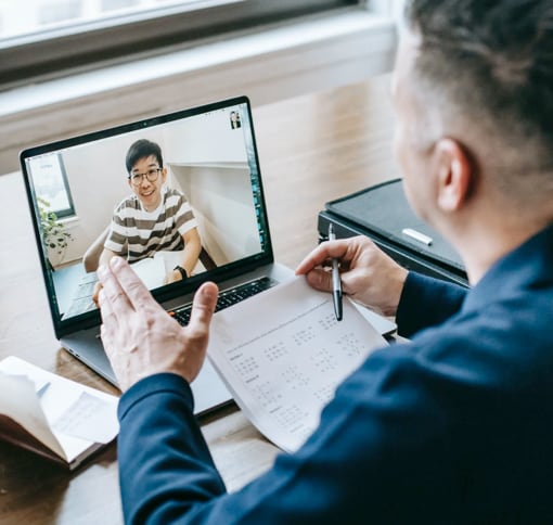 Man on laptop in a video call